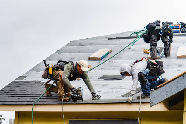 Professional Gutter Installation technician working in Dorset, OH